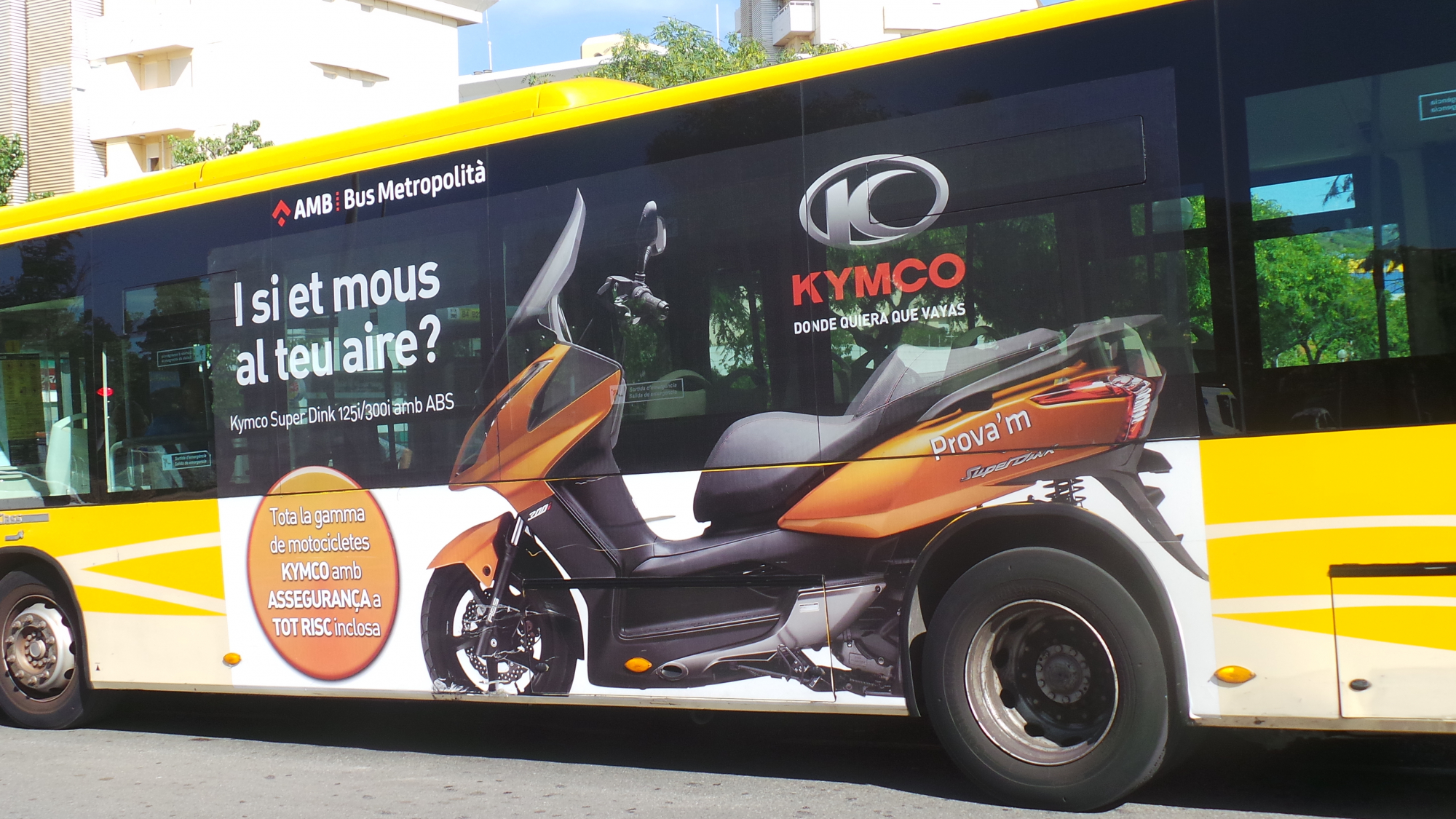 Proyecto creativo diseño gráfico promocional para Kymco - anuncio bus 1- Developmentmedia